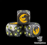 Three black 16mm Gloomspite Gitz D6, the yellow mad moon facing front beside olive pips
