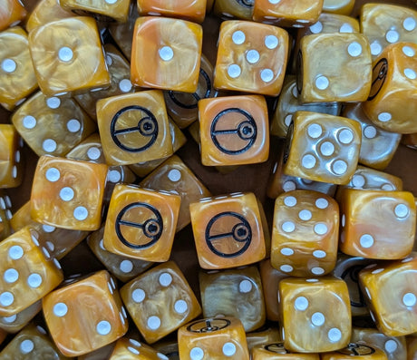 Pile of amber 16mm D6 dice with black sigils for a sci-fi drone army