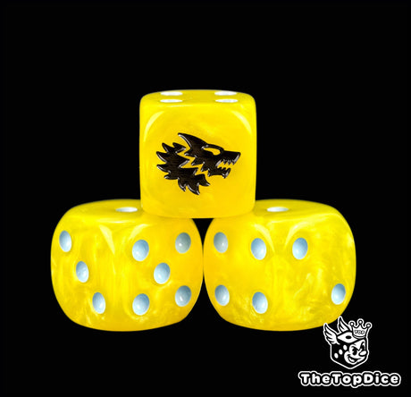 Three yellow wolf dice with ice blue pips and a snarling wolf head