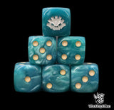 Close up of two blue D6 with a silver aztec rune logo on the six face for fantasy football