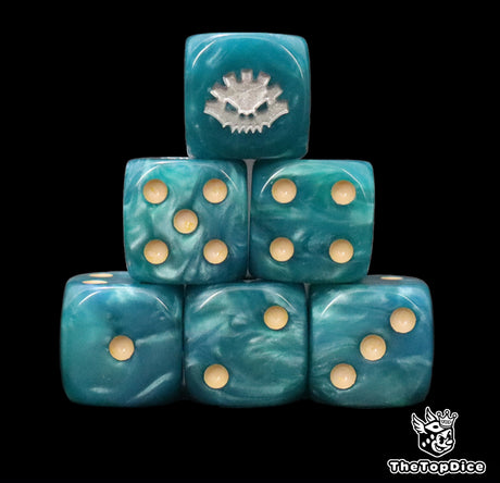 Close up of two blue D6 with a silver aztec rune logo on the six face for fantasy football