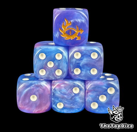 Blue and pink 16mm D6 dice with a gold eye and flames emblem and white pips for fantasy wargaming