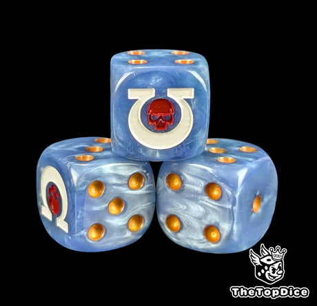 Close-up of a blue D6 die with a red skull sigil and gold pips