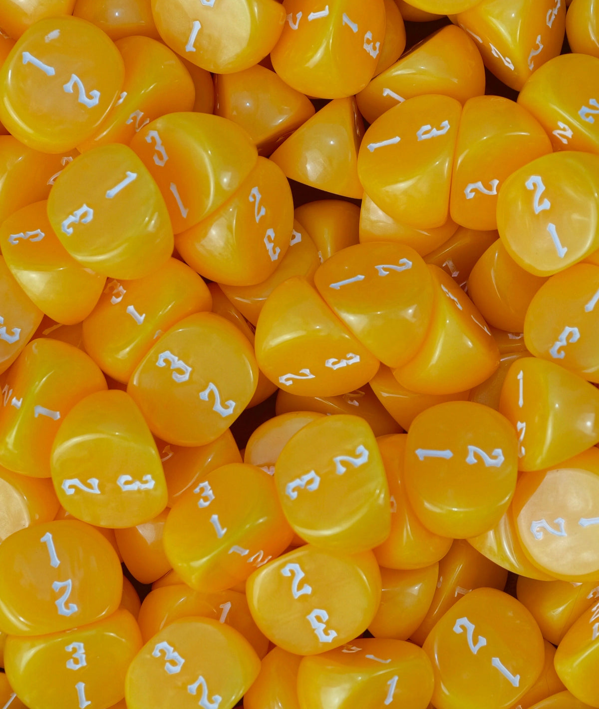 Full tray of banana yellow D3 dice, numbering visible across the top