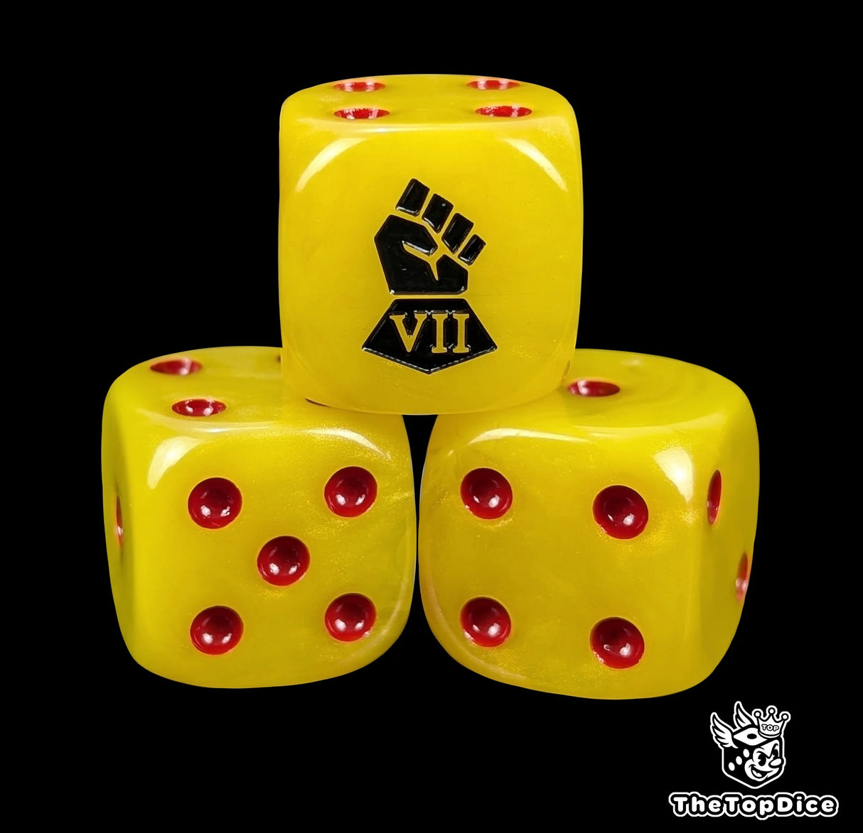 Close-up of three yellow 16mm grimdark D6 dice engraved with a black fist emblem