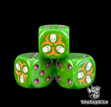 Three yellow flecked green plague dice with a gold three skull ring