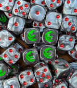 Pile of black grin moon 16mm D6 dice for a fantasy goblin horde