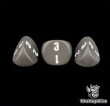 Sharp engraving on matte black 16mm three sided dice, seen close