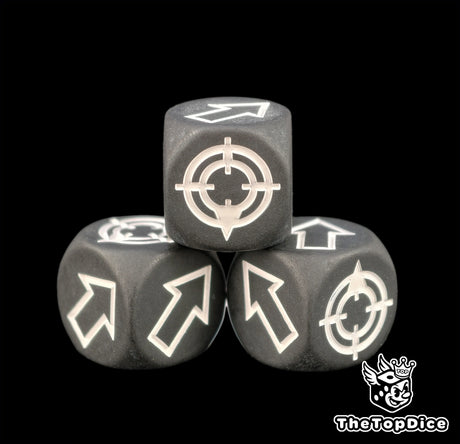 The flat finish killing glare on a matte black scatter die, three of them in frame