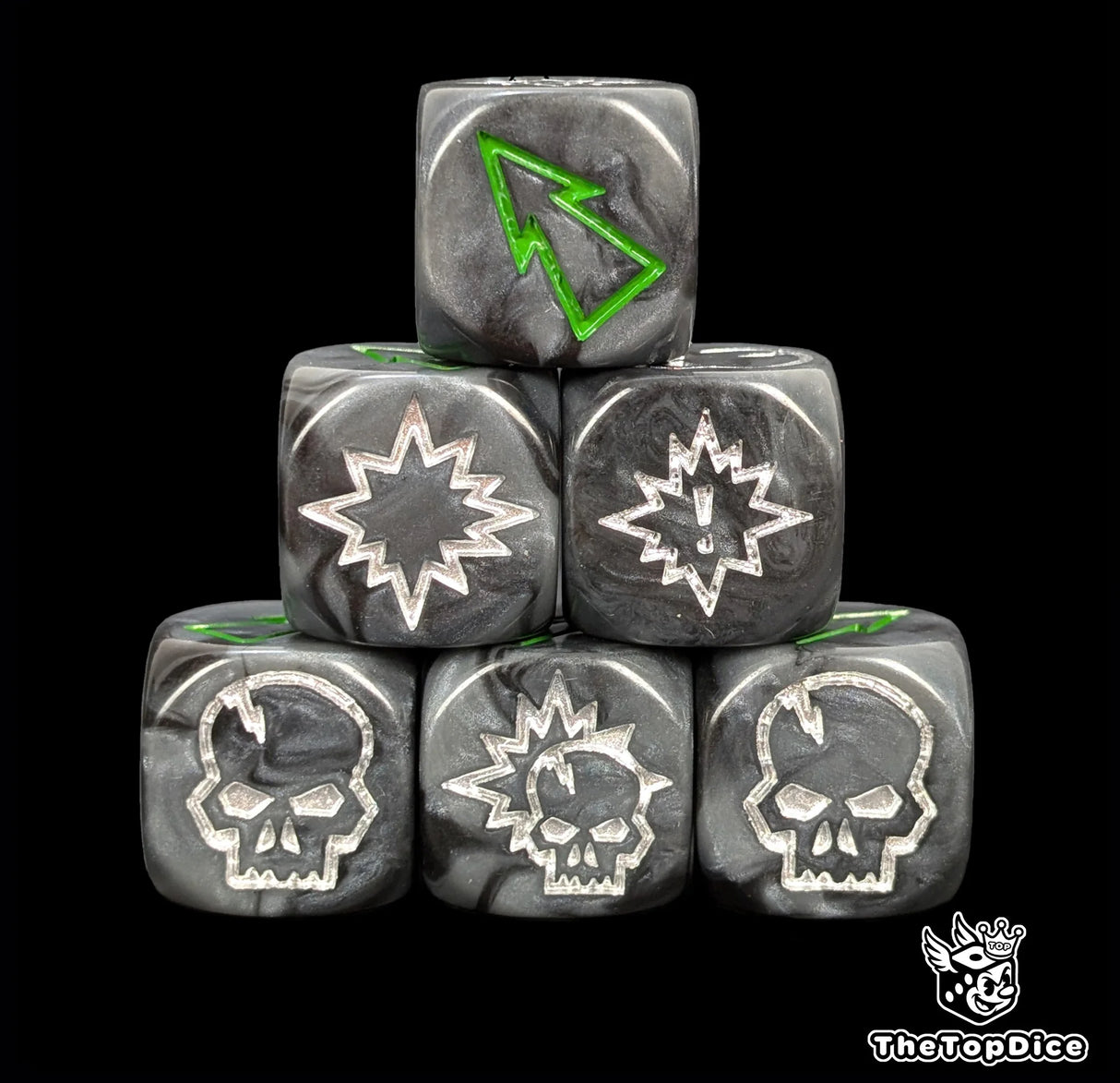 Close up of three black and grey orc 16mm block dice with green pips for resolving blocks