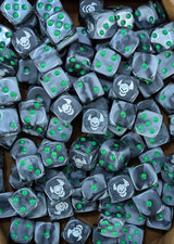 Pile of black orc 16mm D6 dice with green pips for a fantasy orc army