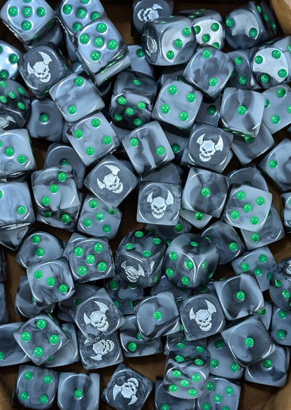 Pile of black orc 16mm D6 dice with green pips for a fantasy orc army