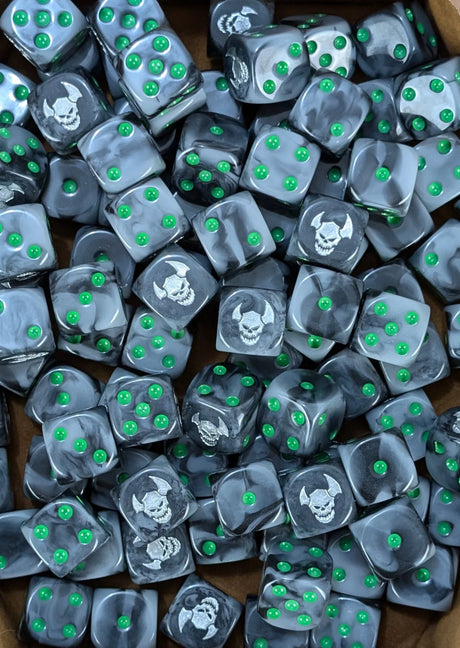Pile of black orc 16mm D6 dice with green pips for a fantasy orc army