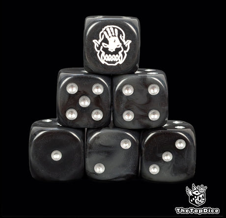 Black 16mm D6 dice with a white hand orc face emblem and silver pips for epic fantasy wargames