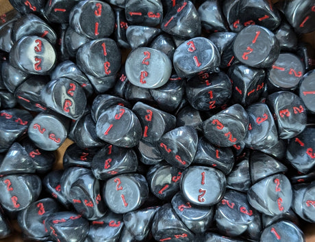 Pile of black D3 three sided dice for tabletop games