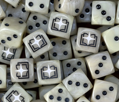 A pile of bone Tome Keepers D6 with black pips and black open books