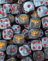 Pile of black twin eagle 16mm D6 dice for a sci-fi guardian army