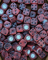 Pile of blood red 16mm D6 dice with white blood drop emblems for a sci-fi rage army