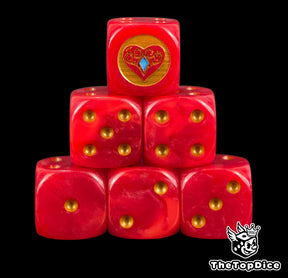 Six blood red Daughters of Khaine D6 stacked, a gold heart and gem