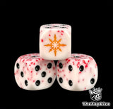 Three red flecked white dice with a gold eight pointed star