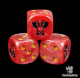 Close up of a red 16mm resin D6 die engraved with a skull crossed by two black axes and gold pips
