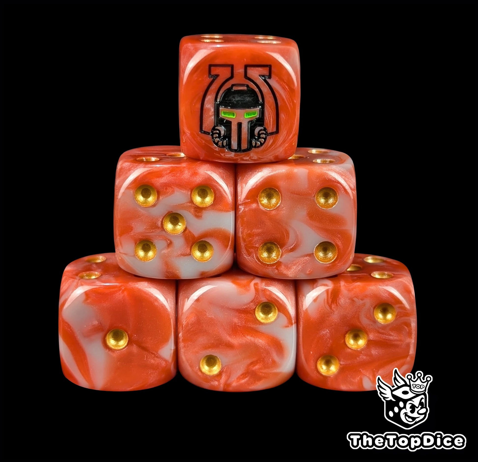 Red resin D6 dice with a black berserker helm emblem and gold pips