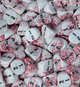 Bloodspatter three sided dice packed across a tray as wound markers