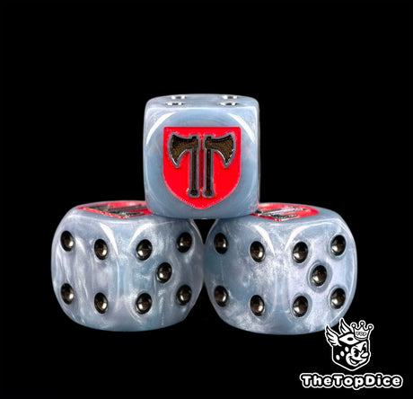 Three steel blue Executioners dice with black pips and the axe shield