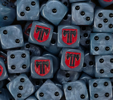 A pile of steel blue Executioners dice with a red axe shield emblem