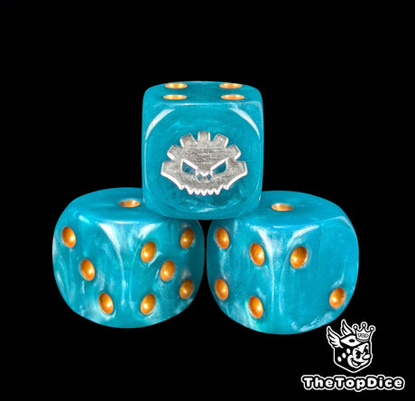 Close up of a blue 16mm resin D6 die engraved with a silver aztec rune and gold pips