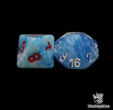Close up of a blue D8 and D16 with red numbers for scatter and long range rolls