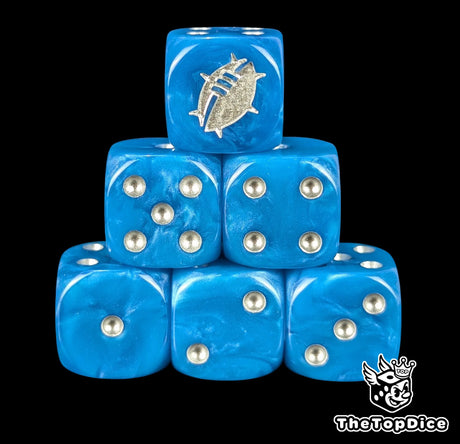 Close up of two blue D6 with a silver custom logo on the six face for fantasy football games
