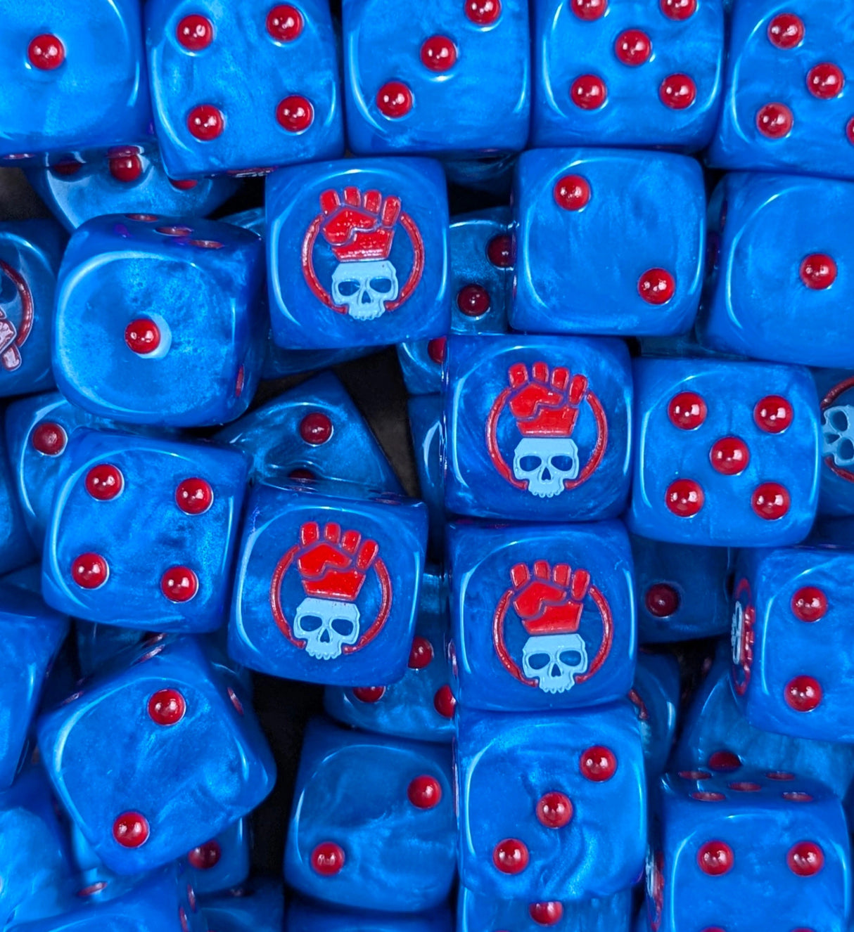 Pile of blue fist skull 16mm D6 dice for a sci-fi marine army
