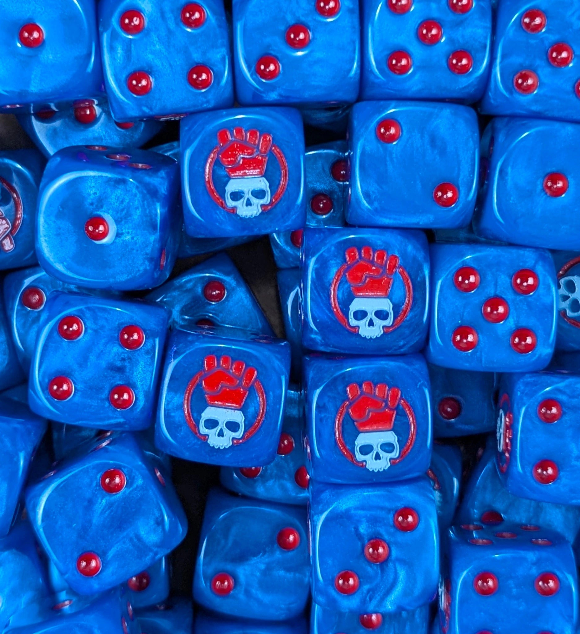 Pile of blue fist skull 16mm D6 dice for a sci-fi marine army