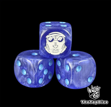 Close up of a dark navy 16mm resin D6 die engraved with a white admiral emblem and ice blue pips