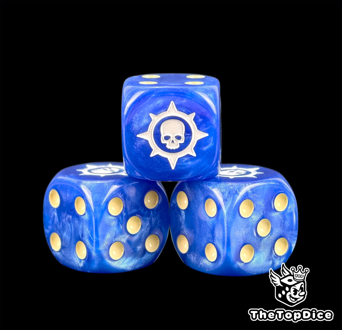 Three blue 16mm Space Marine D6, white skull in a spiked star beside gold pips