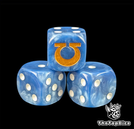 Close up of a blue 16mm resin D6 die engraved with a gold omega and white pips