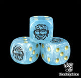 Close up of a blue 16mm resin D6 die engraved with a black phoenix emblem and yellow pips