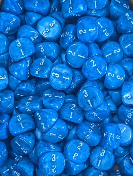 Pile of blue D3 three sided dice for tabletop games