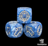 Close up of a blue resin scatter die showing the silver direction arrows