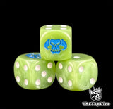 Three pale green orc dice with a blue horned Deathskulls skull