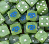 A pile of snot green Ork D6 with white pips and blue horned skulls