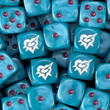 A pile of turquoise Drukhari dice with red pips and white thorned hearts