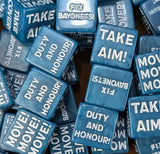 Pile of blue 20mm command tokens beside a sci-fi trench guard army on the table