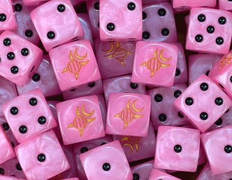 A pile of pink Emperor's Children D6 with gold Slaanesh runes