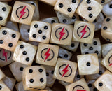 A pile of bone beige Steel Legion D6 with red lightning bolts