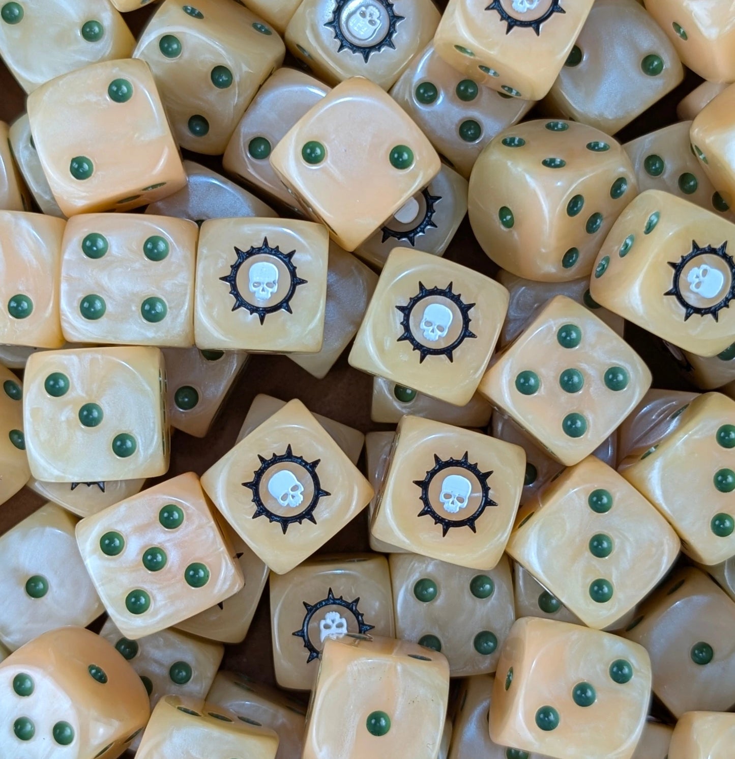 Pile of beige plague skull 16mm D6 dice for a sci-fi plague legion army