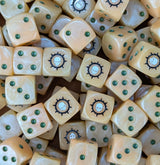 Pile of beige plague skull 16mm D6 dice for a sci-fi plague legion army