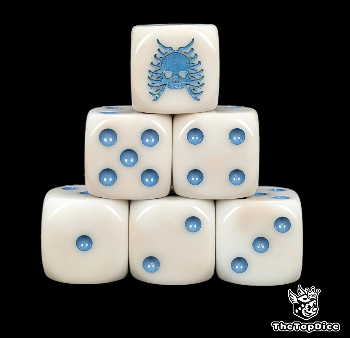Bone white 16mm D6 dice with a blue skull emblem and blue pips for fantasy wargaming