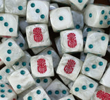A pile of bone white Votann D6 with teal pips and red kin runes